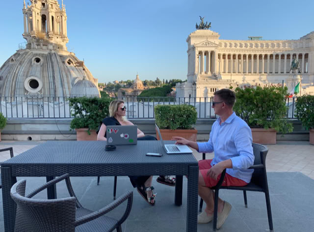Working session on a rooftop terrace in Rome