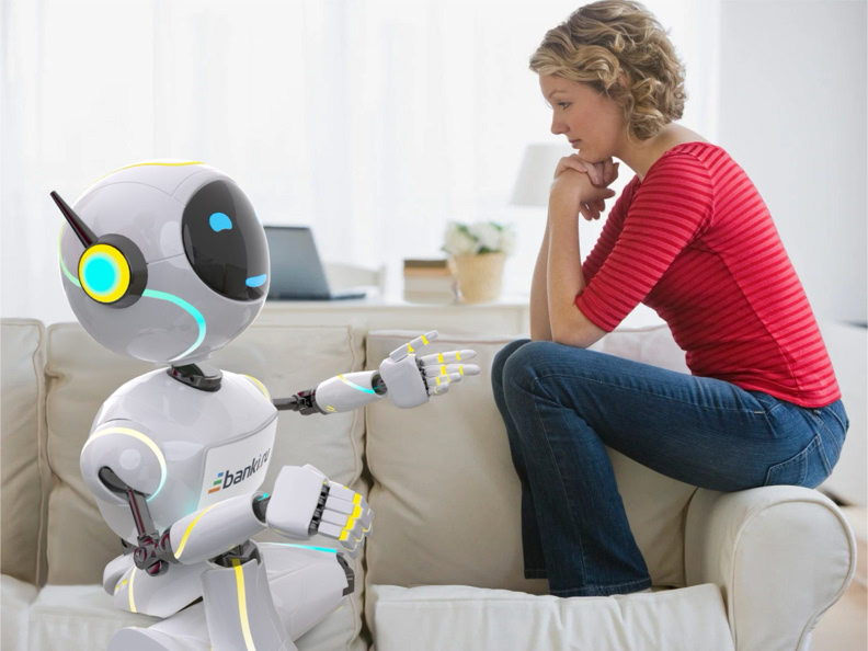 A woman in a red shirt sits on a couch, facing a small humanoid robot with glowing blue and yellow eyes.