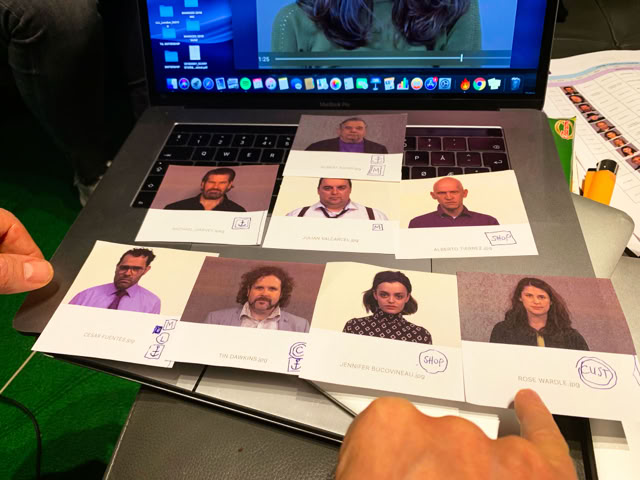 Casting photos laid out on a laptop